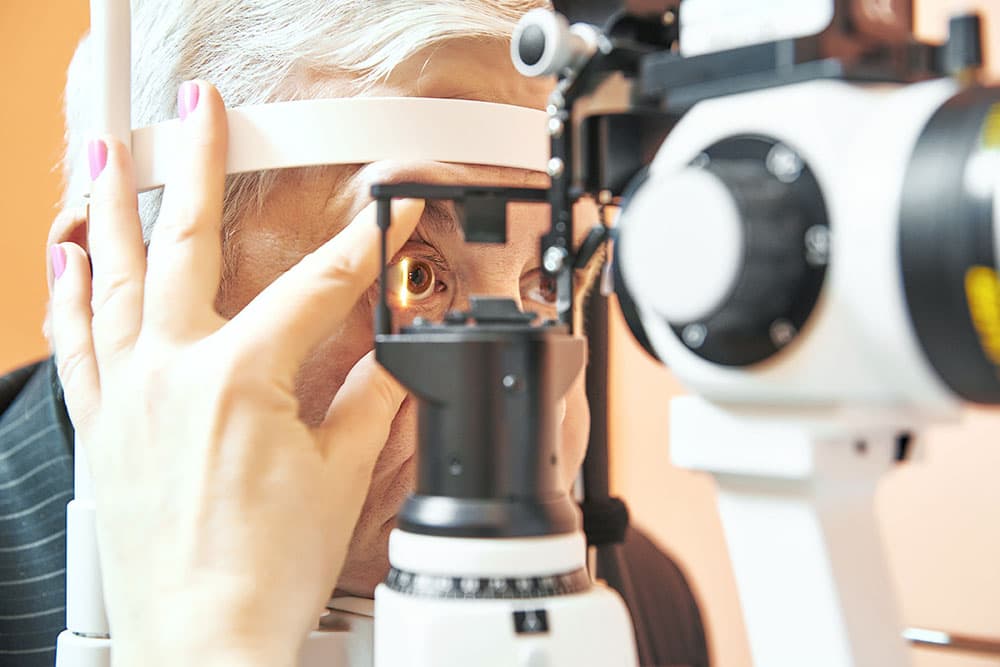 Senior man getting his eyes examined